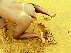 A hot gay Latino guy shows off his ass on the beach in this video