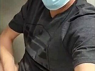 Solo male pleasure in workplace restroom