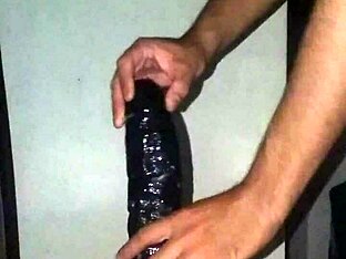 I shit: shemale fucked herself with a big black toy in solo video