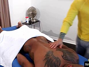 Inked man's sensual massage and blowjob