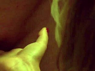 A BDSM scene with a submissive lesbian slave who is spanked and fingered by her mistress