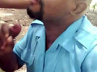Public park security guard gives oral sex in nature