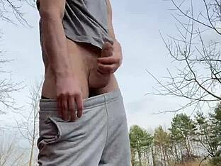 Teen boy masturbates outdoors freely