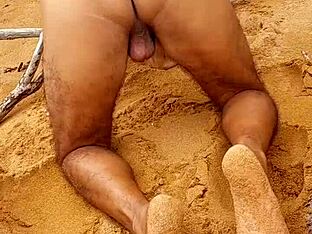 Hot shemale shows off her ass on the beach in this solo amateur video