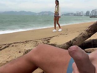Skinny teen gets off on public beach cock flashing fetish