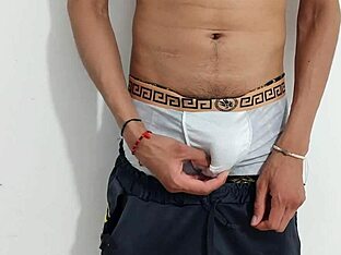 A bisexual amateur masturbates his uncut cock