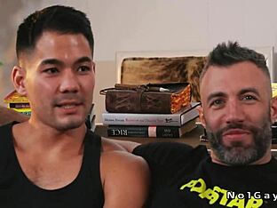 Asian hunk gets a monster cock in his ass on a live show