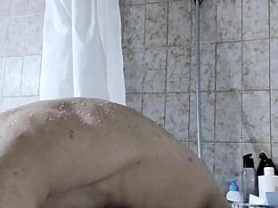 Dude takes shower, then wanks his big cock